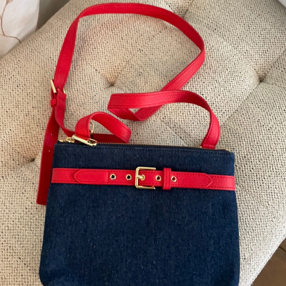 Talbots Denim with red leather strap and buckle.